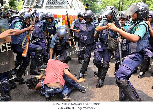 Dhaka 10 May 2015: Police maul protesters during a march to besiege Dhaka police headquarters demanding action over the sexual assault on women during Pahela...
