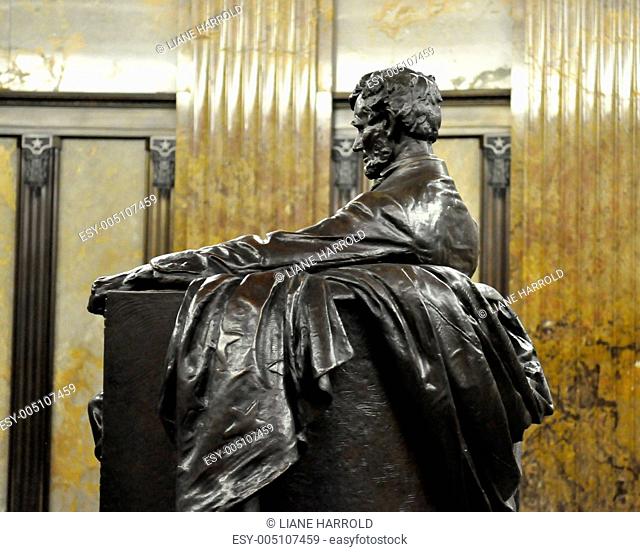 Abraham Lincoln Sits - side view