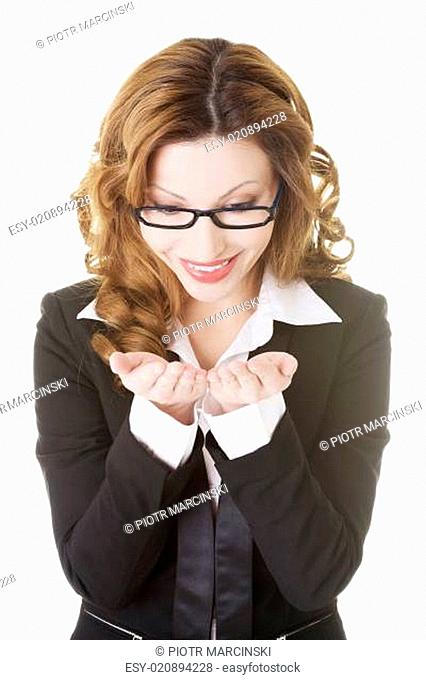 Businesswoman showing copy space on her palm