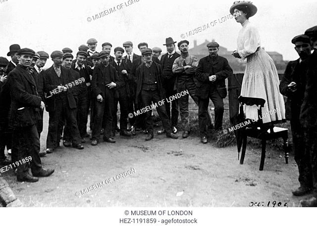 Una Dugdale addressing a small crowd of men at the Newcastle by-election, September, 1908. Dugdale's sisters, Joan and Daisy, were also suffragettes