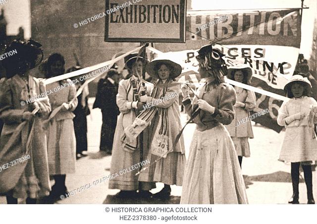 Young suffragettes promote the fortnight-long Women's Exhibition, London, 13 May 1909. The exhibition, organised by the Women's Social and Political Union...