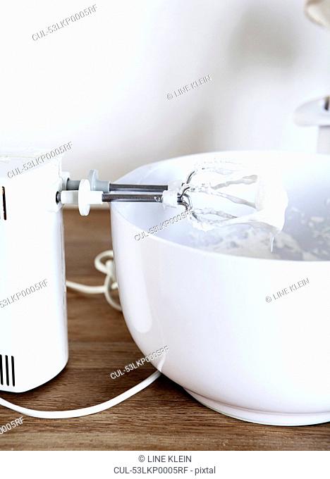 Electric mixer with whipped cream