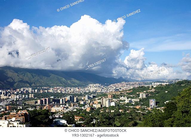 Overview of the Venezuelan capital, Caracas, at the base of Avila mountain covered by clouds, Venezuela, July 25, 2008