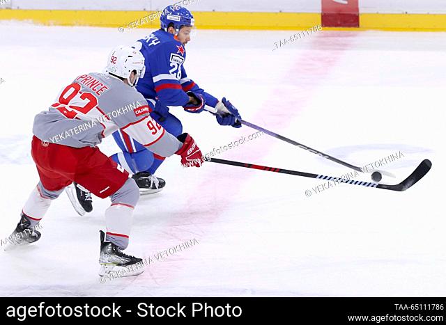 RUSSIA, ST PETERSBURG - NOVEMBER 23, 2023: HC Spartak Moscow's Shane Prince (L) and HC SKA St Petersburg's Sergei Tolchinsky in action in their 2023/24 KHL...