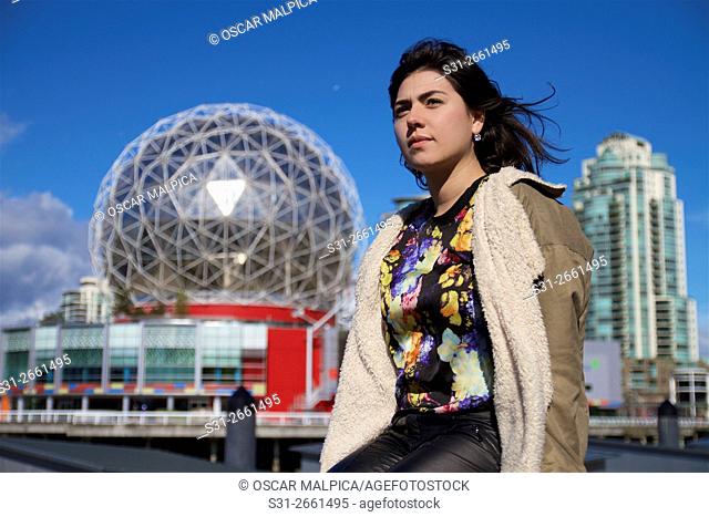 beautiful young Colombian girl enjoying a sunny day along the seawall in Vancouver Canada