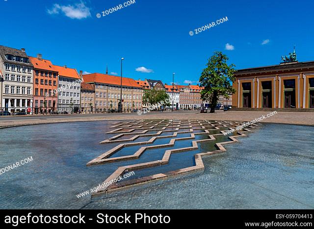 Copenhagen, Denmark - 13 June, 2021: A view of the intricate pools and water fountains at the Bertel Thorvadlsens Square in front of the museum