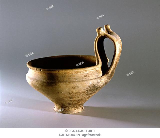Etruscan civilization, 8th century b.C. Terracotta kantharos with bifurcated handle. From Montegrotto Terme, Sanctuary of S