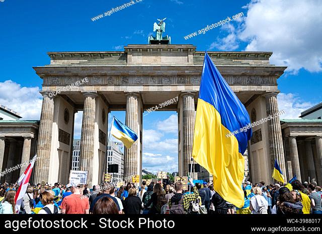 Berlin, Germany, Europe - A peaceful protest rally with Ukrainians, refugees, activists and supporters in front of the Brandenburg Gate according to the motto...