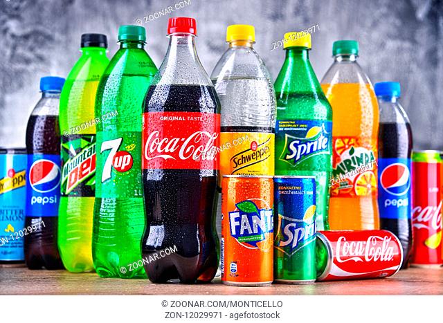 Bottles of global soft drink brands including products of Coca Cola Company and Pepsico