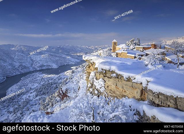 Siurana village in a winter snowy sunrise after a heavy snowfall (Priorat, Tarragona, Catalonia, Spain)