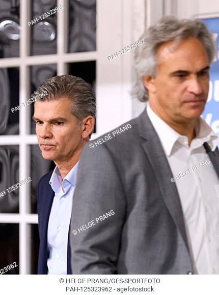 KSC President Ingo Wellenreuther and candidate Martin Mueller walk past each other. GES / football / 2. Bundesliga: Information event of the supporters...