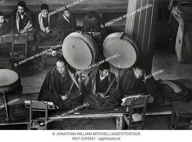 INDIA Sikkim -- circa 1965-1971 -- Drumbeats accompany prayers inside a monastery in Sikkim India -- Picture by Alice S Candell/Atlas Photo Archive