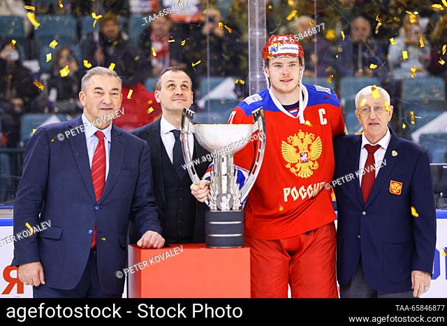 RUSSIA, ST PETERSBURG - DECEMBER 17, 2023: Russian Ice Hockey Federation President Vladislav Tretiak, Russia 25's Alexander Nikishin