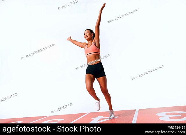Female athlete sprint ran to the finish