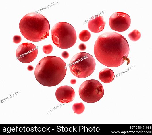 Cranberry berries in the shape of a heart on a white background
