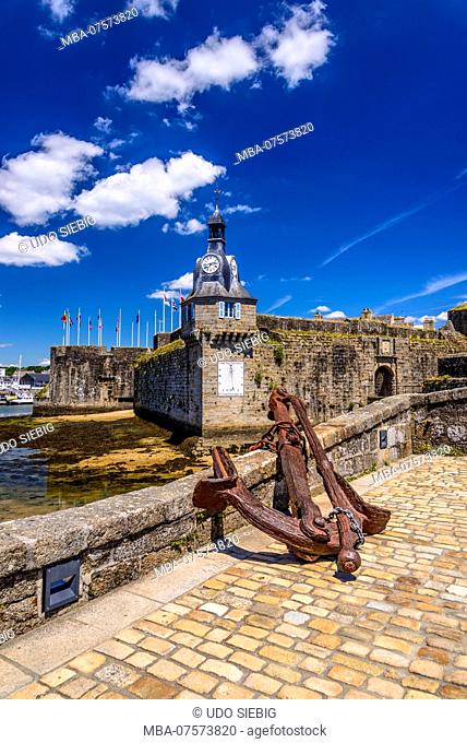 France, Brittany, FinistÃ¨re Department, Concarneau, Ville Close, gate with clock tower and anchor
