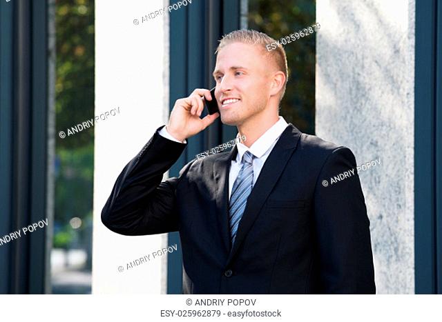 Close-up Of A Businessman Talking On Cellphone