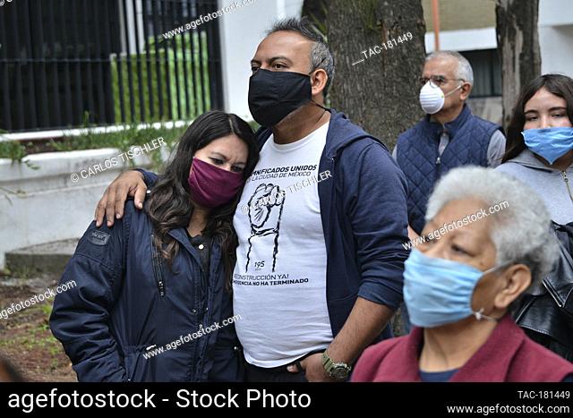 MEXICO CITY, MEXICO - SEPTEMBER 19 : Persons wear protective masks while take part  during a mass in memory of the victims who lost their lives in the...