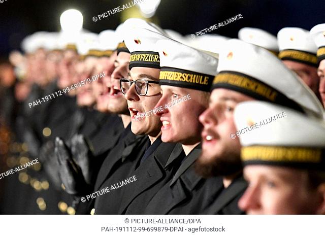 12 November 2019, Schleswig-Holstein, Plön: Soldiers stand in front of the castle during a solemn swearing-in ceremony. Around 220 soldiers from the Plön Naval...