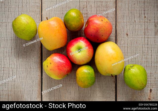 Apples and other on the old wooden floor