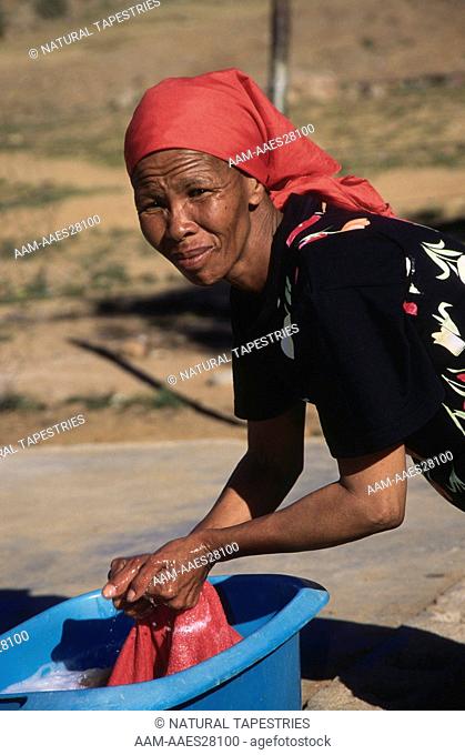 Woman washing Clothes in Village near Kamieskroon, South Africa