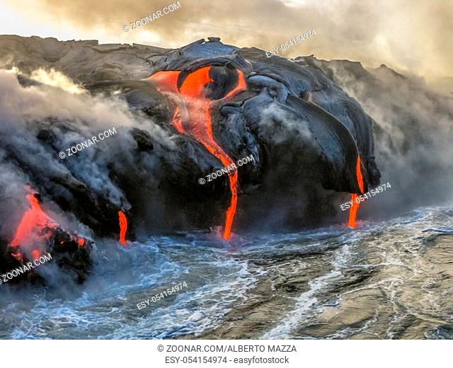 Kilauea Volcano in Hawaii Volcanoes National Park, also known Kilauea Smile because from 2016 seems to smile, erupting lava into Pacific Ocean, Big Island