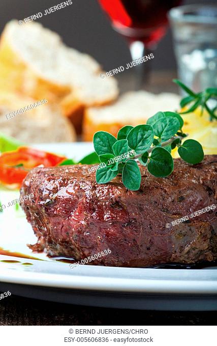 grilled steak with oregano