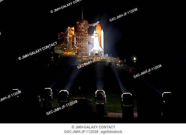 The space shuttle Discovery is seen shortly after the Rotating Service Structure was rolled back at launch pad 39A, at the Kennedy Space Center in Cape...
