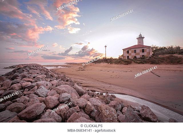 Bibione, District of Venice, Veneto, Italy. The Lighthouse of Bibione at sunset