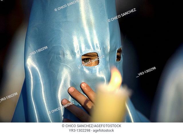 A penitent participates in a Holy Week procession in the town of Prado del Rey in southern Spain's Cadiz Sierra region in Andalucia, March 28