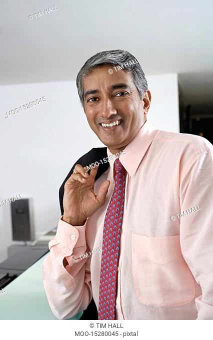Middle aged businessman smiling portrait