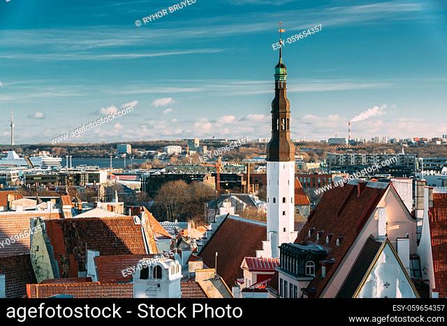Tallinn, Estonia. Tower Of Church Of Holy Ghost Or Holy Spirit Is Medieval Lutheran Church Located Behind Raekoja Plats, Opposite Great Guild And Maiasmokk And...