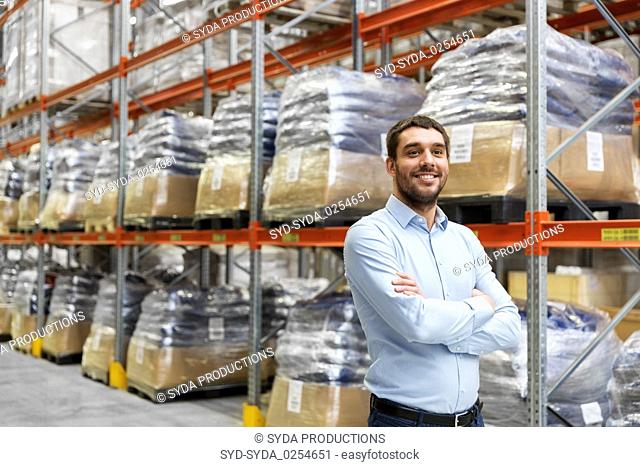 happy businessman at warehouse