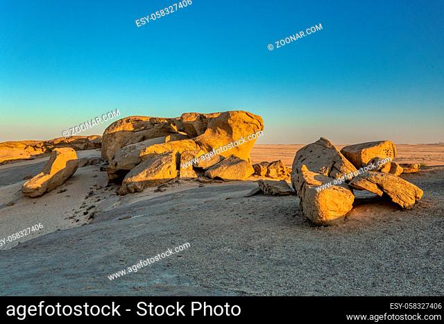 Landscape in Vogelfederberg, interesting rock formation in Namib desert in sunset, Namibia wilderness, Africa nature