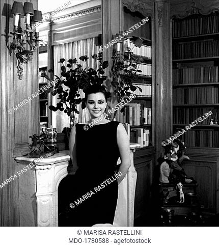 Giovanna Ralli smiling. Portrait of Italian actress Giovanna Ralli smiling in her house bought with the money earned from her first films. Rome, 1964