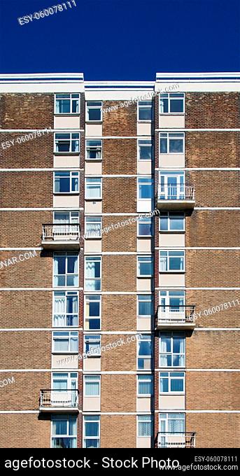 a view of a typical british council built high rise apartment block typical of public housing in the uk