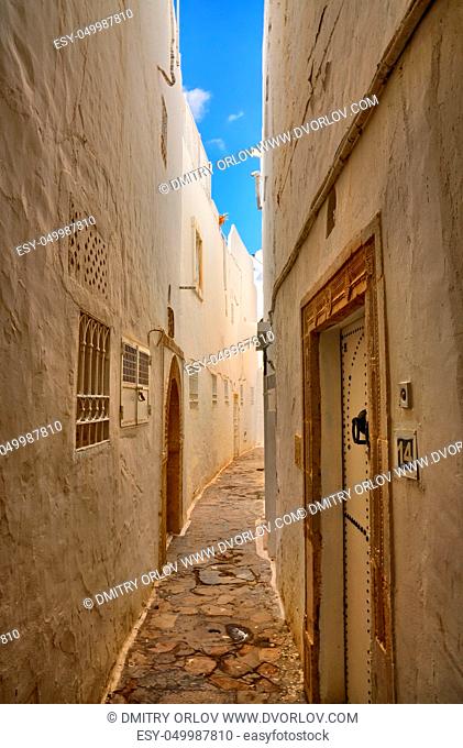Narrow street of ancient Medina in Hammamet, Tunisia, Mediterranean Sea, Africa, HDR