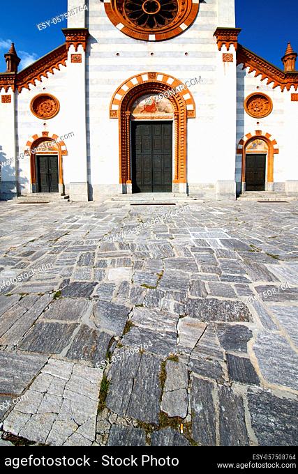 church in the  mercallo closed brick tower sidewalk italy lombardy   old