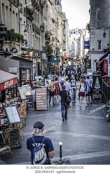 People wlaking in Rue Montorgueil, Paris, France