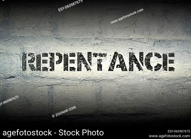 repentance stencil print on the grunge white brick wall