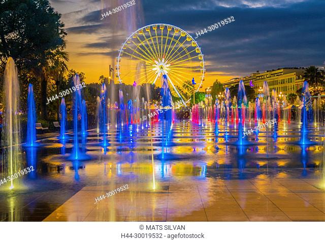 Water Fountain and Ferris wheel in Dusk in Nice in Provence-Alpes-Côte d'Azur, France