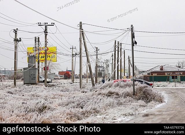 RUSSIA, ROSTOV REGION - DECEMBER 15, 2023: Ice-covered power transmission lines are pictured after freezing rain in the village of Krasny Krym