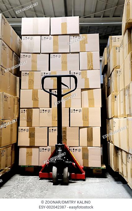 manual fork pallet truck in warehouse