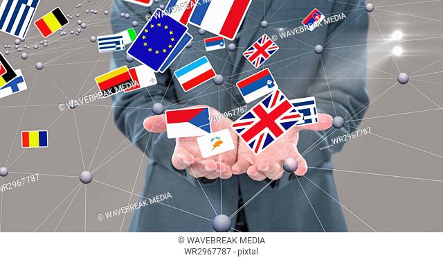 Midsection of business person surrounded with various flags and connecting dots