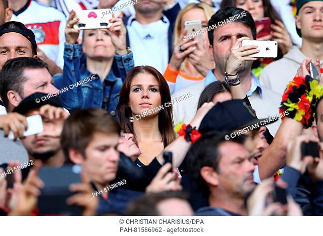 Lina Meyer (C), girlfriend of Germany's Joshua Kimmich, is seen in the stands during the UEFA EURO 2016 Round of 16 soccer match between Germany and Slovakia at...