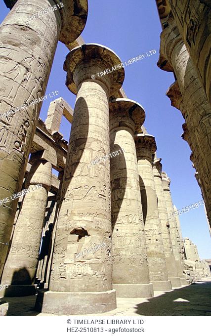 Pillars in the Great Hippostyle Hall, Temple of Karnak, Egypt. The Temple of Amun-Re at Karnak was built in the 14th-13th century BC