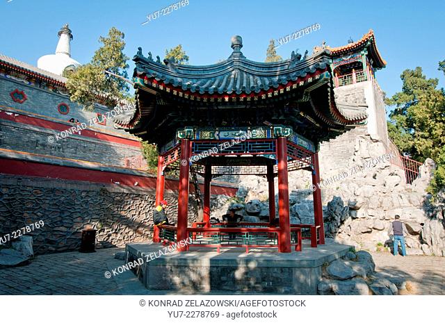 Small pavilion in Yong'An Temple (Temple of Everlasting Peace) with Bai Ta (White Pagoda or Dagoba) stupa in Beihai Park, Beijing