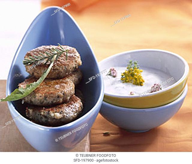 Oatmeal burgers and sour cream dip with yarrow