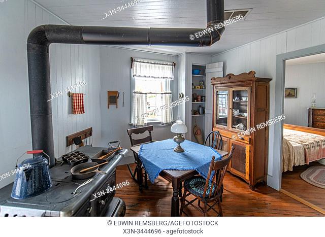 A furnished kitchen inside of the Drum Point Lighthouse,