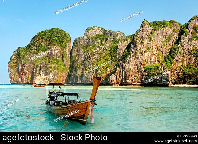 Longtail boat anchored at Maya Bay on Phi Phi Leh Island, Krabi Province, Thailand. It is part of Mu Ko Phi Phi National Park